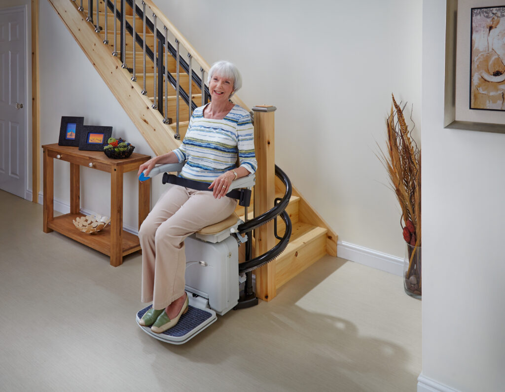 Bruno stair lift installation team assisting a customer at home in Suffolk, VA near me.