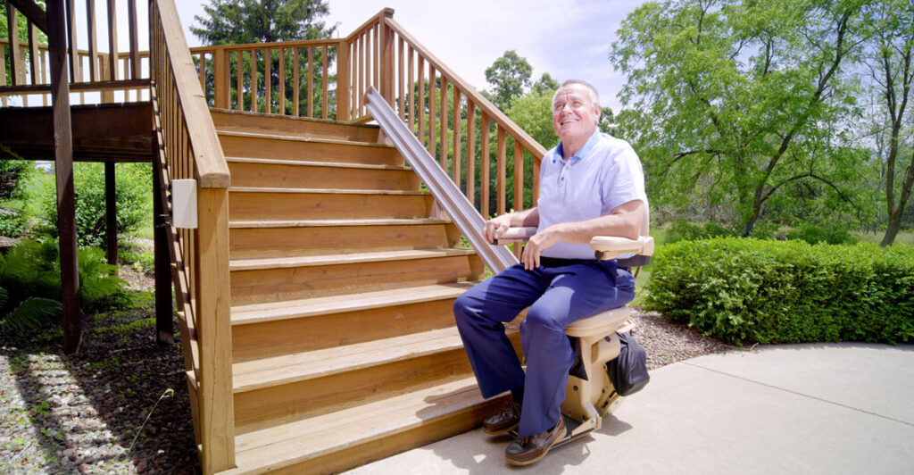 Outdoor stair lift installed on a residential porch in Norfolk, VA